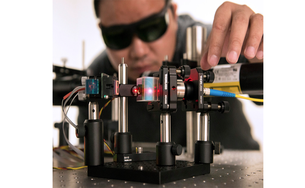 Man looking at laser